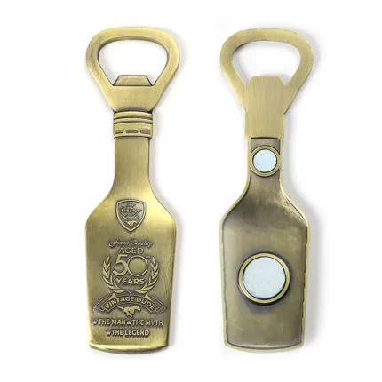 3695-2-Apribottiglie a forma di bottiglia in bronzo antico
